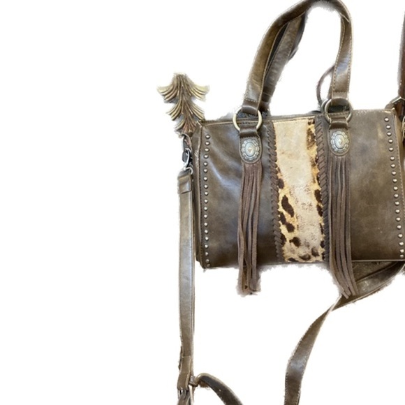 And I’m gonna have western style for concealed gun purse - Picture 3 of 6